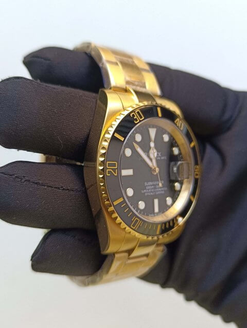 rolex submariner black and gold