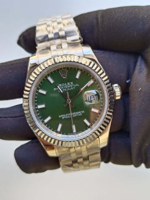 green dial rolex watch
